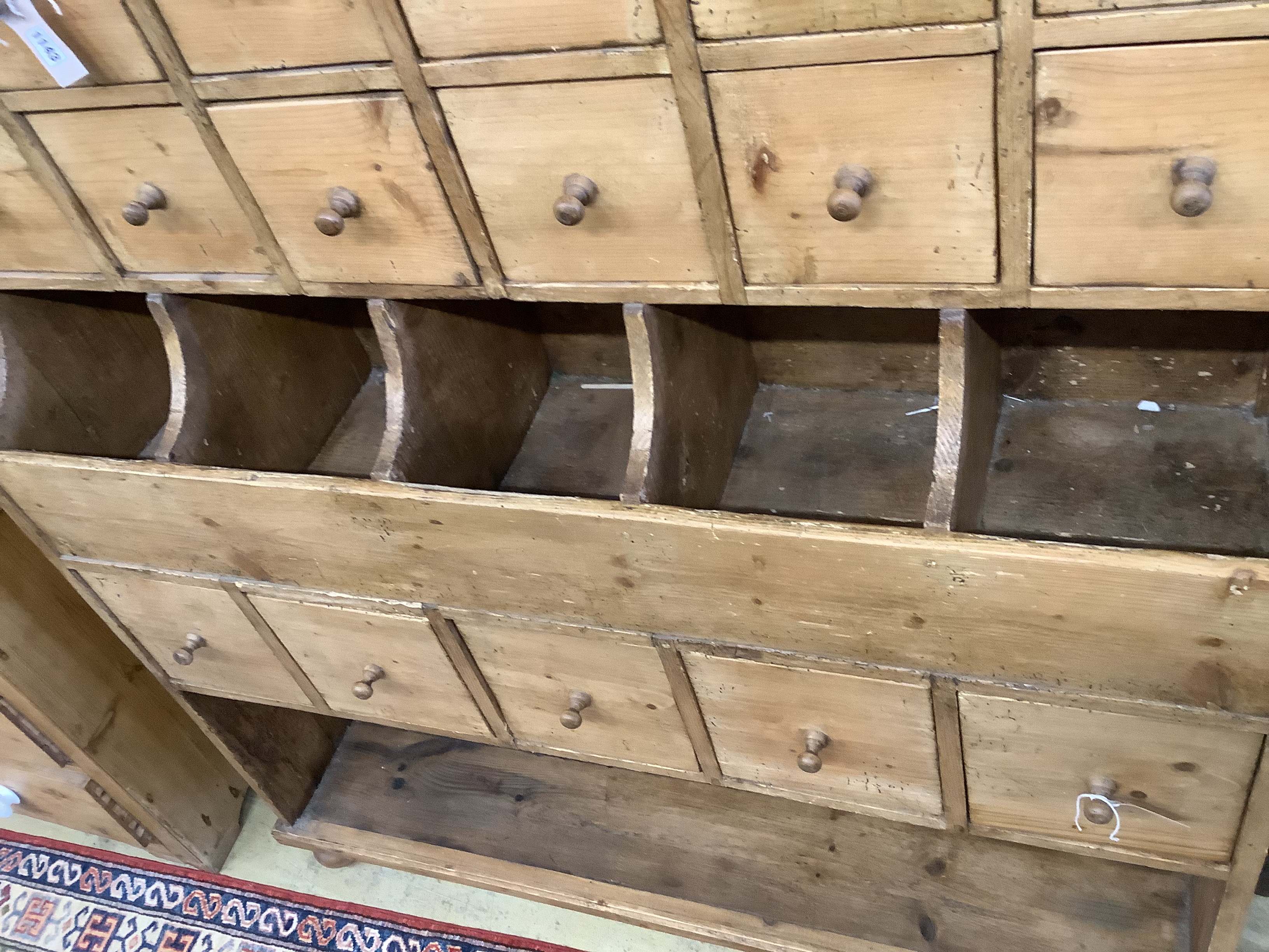 A Victorian pine grocer's shop cabinet